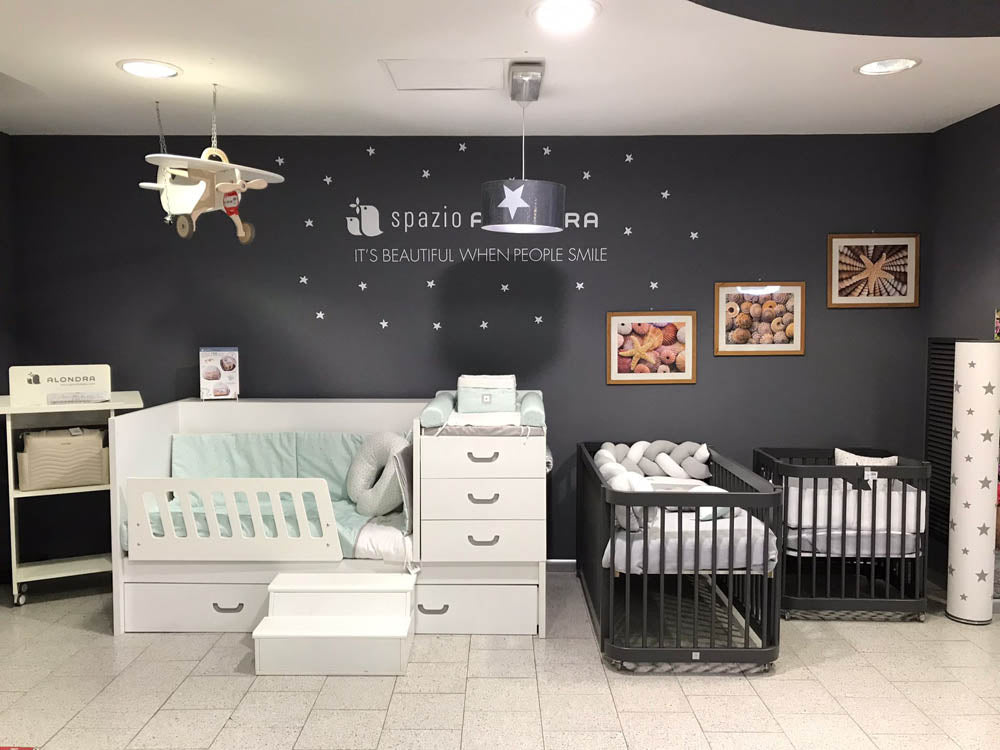 Exposición cunas en Iperbimbo Torino