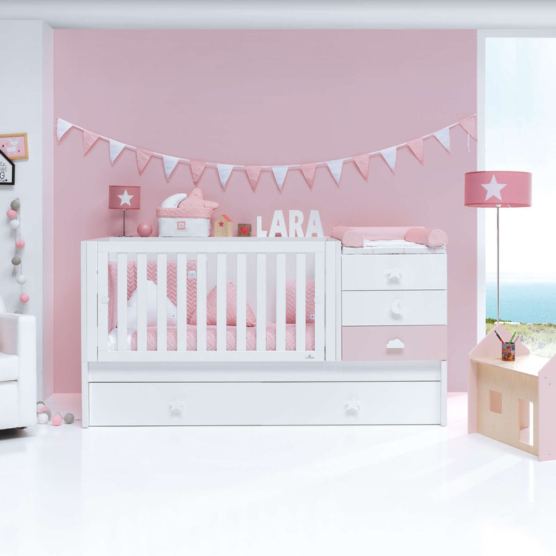 Cuna convertible con cama nido y cajones en color rosa pink